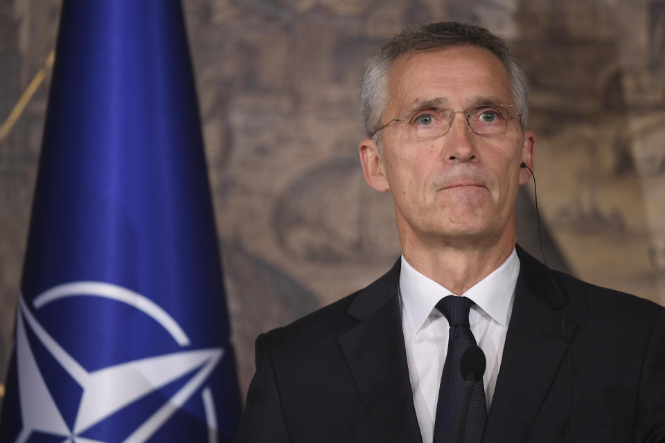 NATO Secretary General Jens Stoltenberg listens during a joint press conference with Turkish Foreign Minister Mevlut Cavusoglu, in Istanbul, Friday, Oct. 11, 2019. NATO's secretary-general says he acknowledges Turkey's legitimate security concerns but has urged Ankara to exercise restraint in its incursion into northeast Syria. (AP Photo/Akin Celiktas)