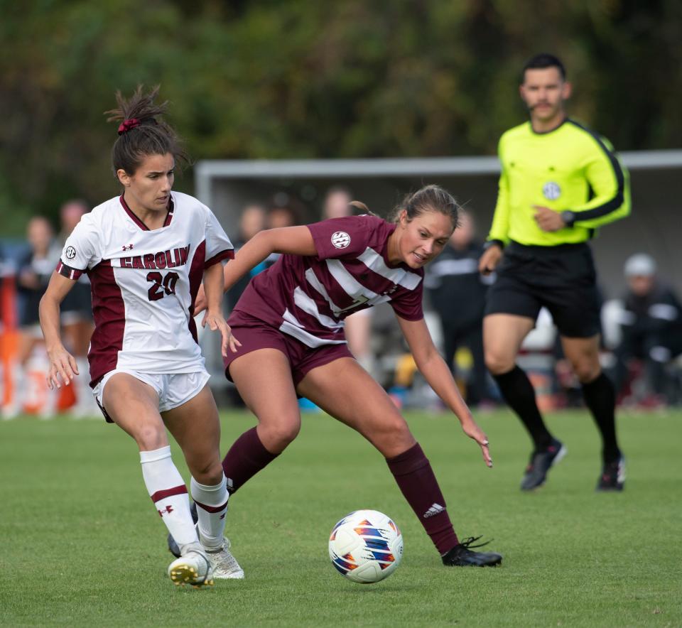 South Carolina's Corinna Zullo(No. 20) challenges Texas A&M's Sydney Becerra (No. 7) for possession of the ball during the SEC Soccer Tournament quarterfinals in Pensacola, FL. on Tuesday, Oct. 31, 2023.