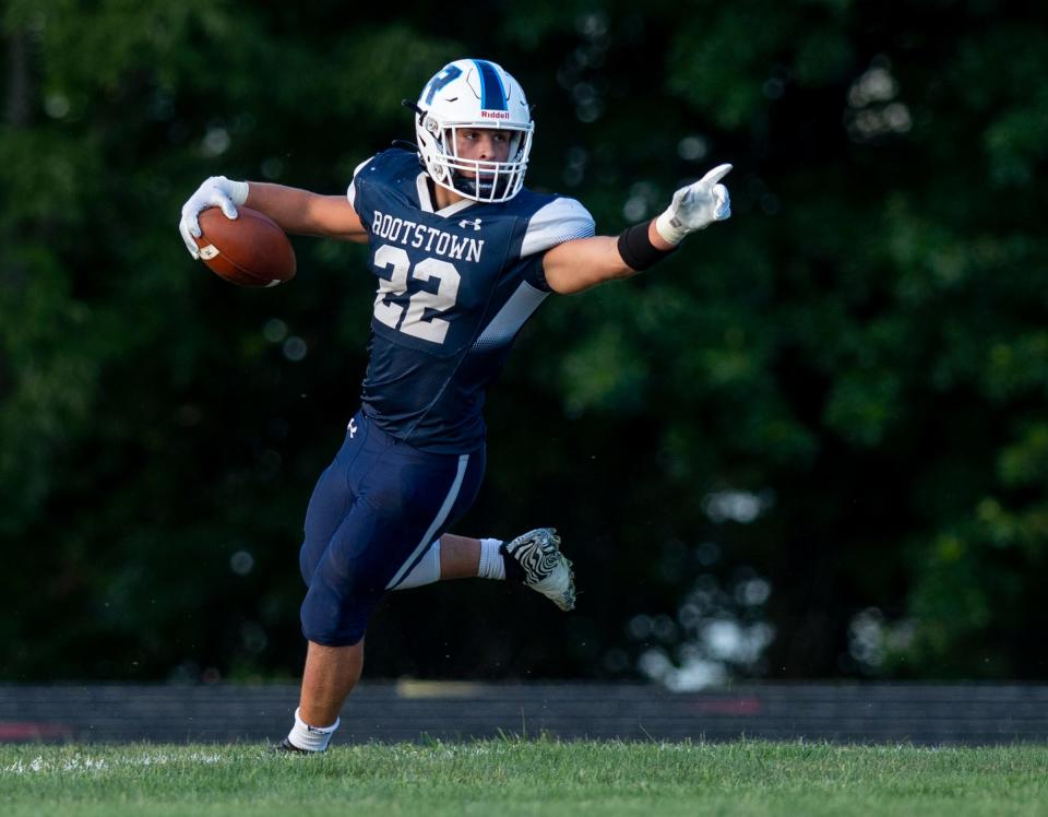 Rootstown's Cody Coontz celebrates in the end zone after scoring a touchdown against Crestwood.