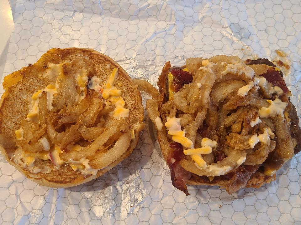 Wendy's Big bacon cheddar cheeseburger open on a white wrapper