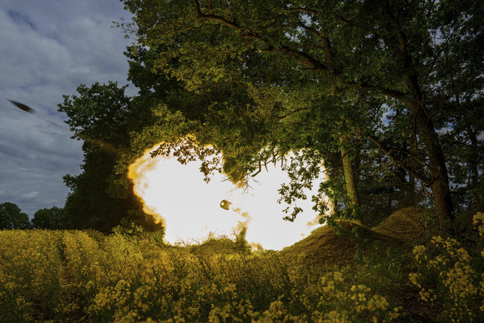 A Ukrainian artillery vehicle from the 57th Brigade fires towards Russian front-line positions in Ukraine’s Kharkiv region, Sunday, May 19, 2024. (AP Photo/Evgeniy Maloletka)