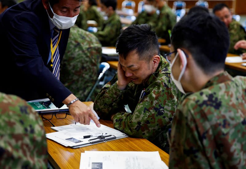 Japan Ground Self-Defence Force (JGSDF) soldiers participate in a seminar to prevent harassment at JGSDF Camp Asaka, in Tokyo