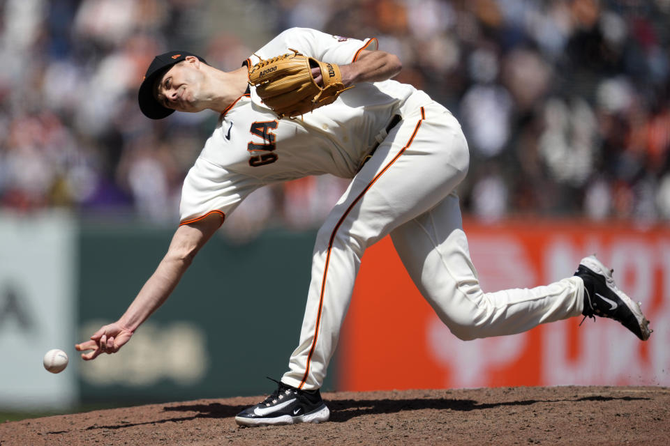 San Francisco Giants pitcher Tyler Rogers throws to a Pittsburgh Pirates batter during the eighth inning of a baseball game in San Francisco, Wednesday, May 31, 2023. (AP Photo/Tony Avelar)