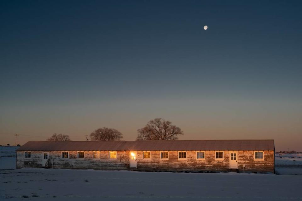 The rising sun reflects off windows of the Block 22 barrack at the Minidoka National Historic Site on Feb. 19, which was the 80th anniversary of the signing of Executive Order 9066 by President Franklin D. Roosevelt, which resulted in the incarceration of more than 120,000 Japanese Americans.