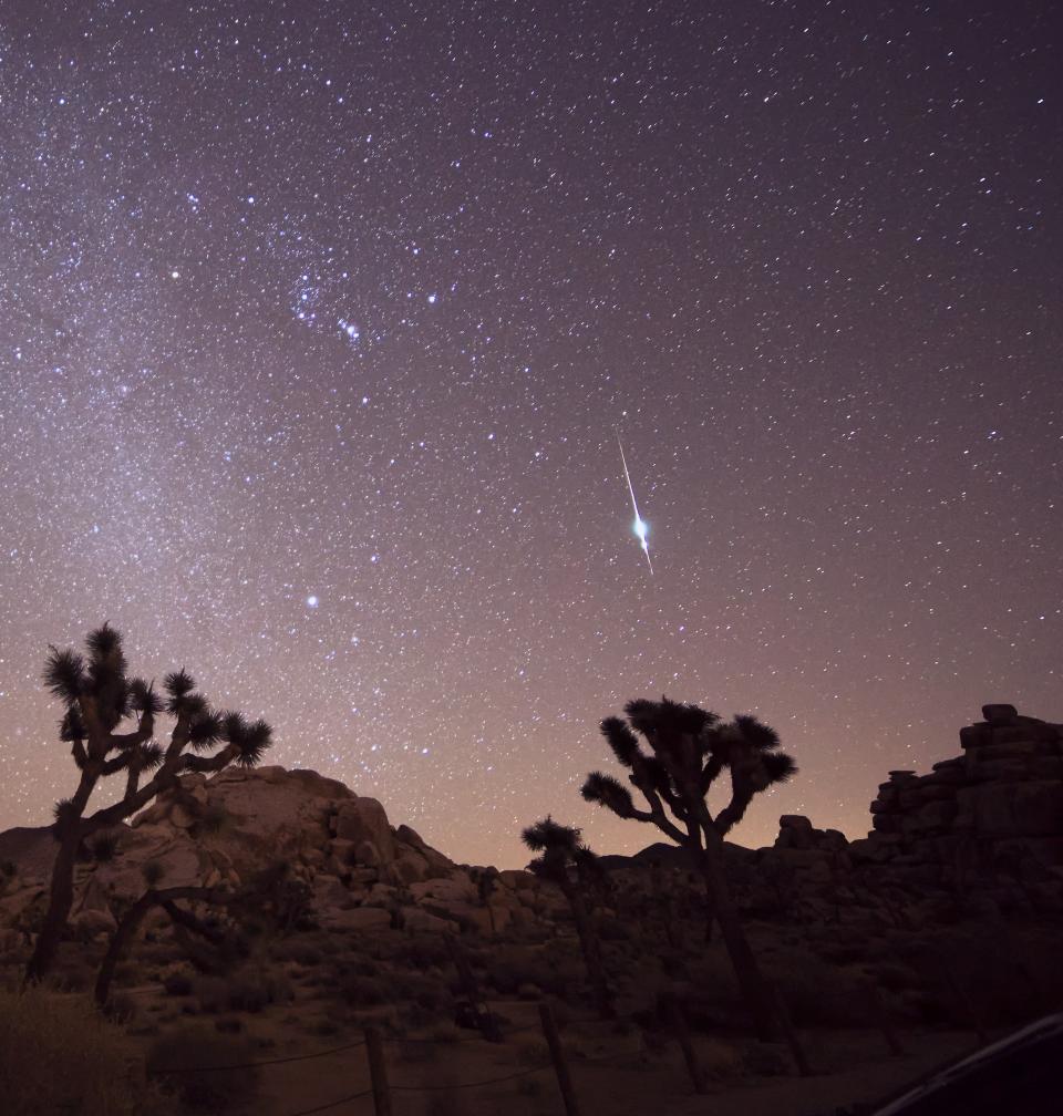 This cropped image shows a bright meteor from the Taurid meteor shower, photographed Nov. 6, 2015, by Channone Arif from Joshua Tree, California. A 30-second exposure was made with a Canon 6d -Rokinon 14mm, set at f/2.8 and ISO 6400. CC BY 2.0 license.