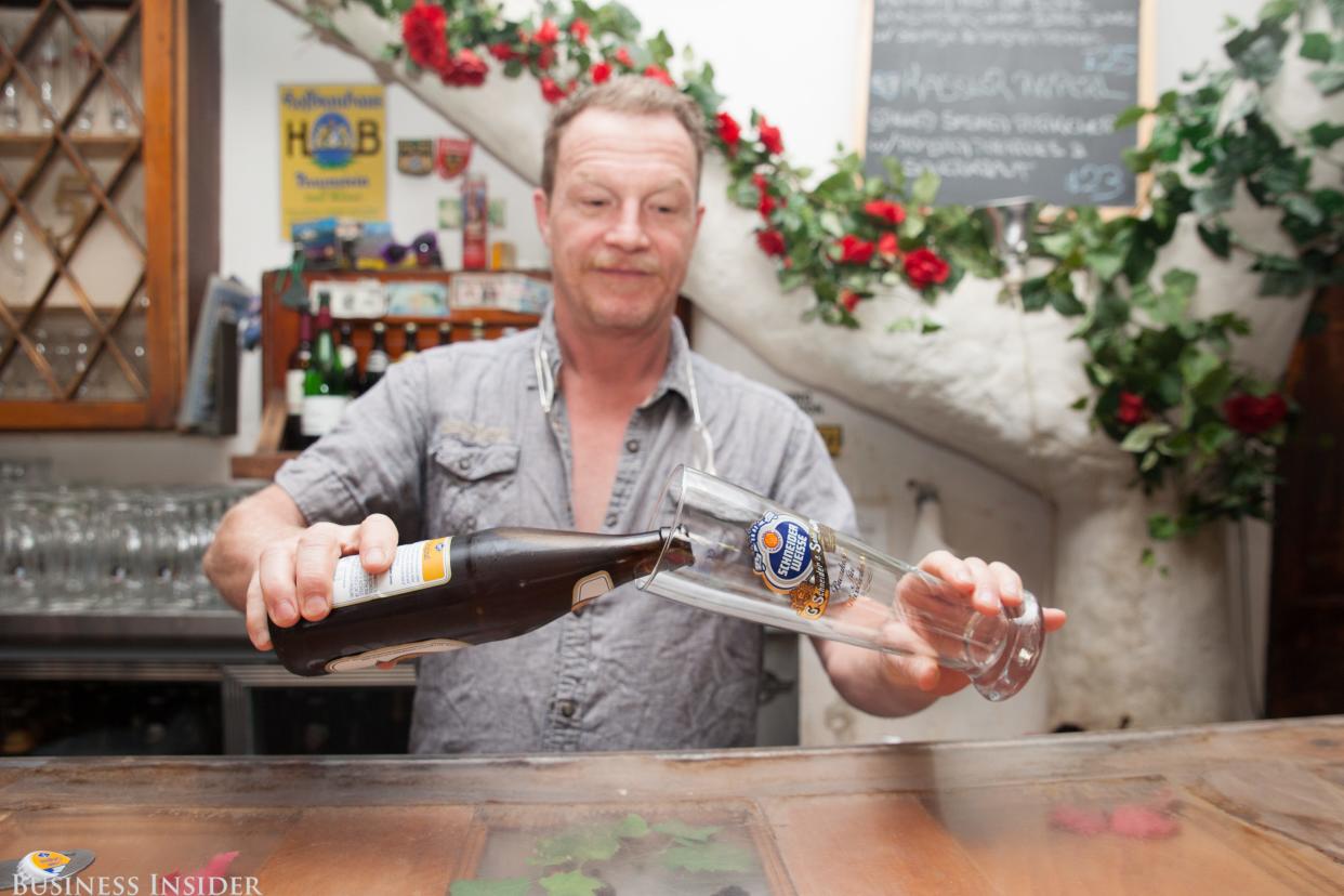 Sylvester Schneider, pouring beer