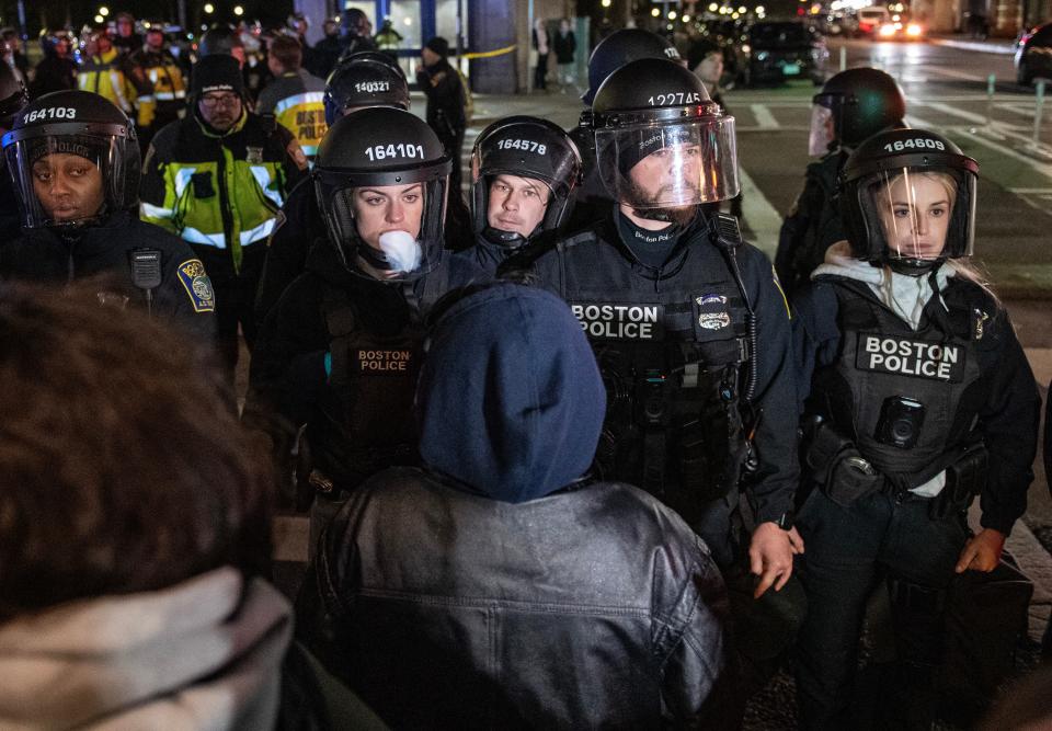 Police and pro-Palestinian supporters face off after the Emerson College protest camp was cleared by officers in Boston on April 25, 2024.