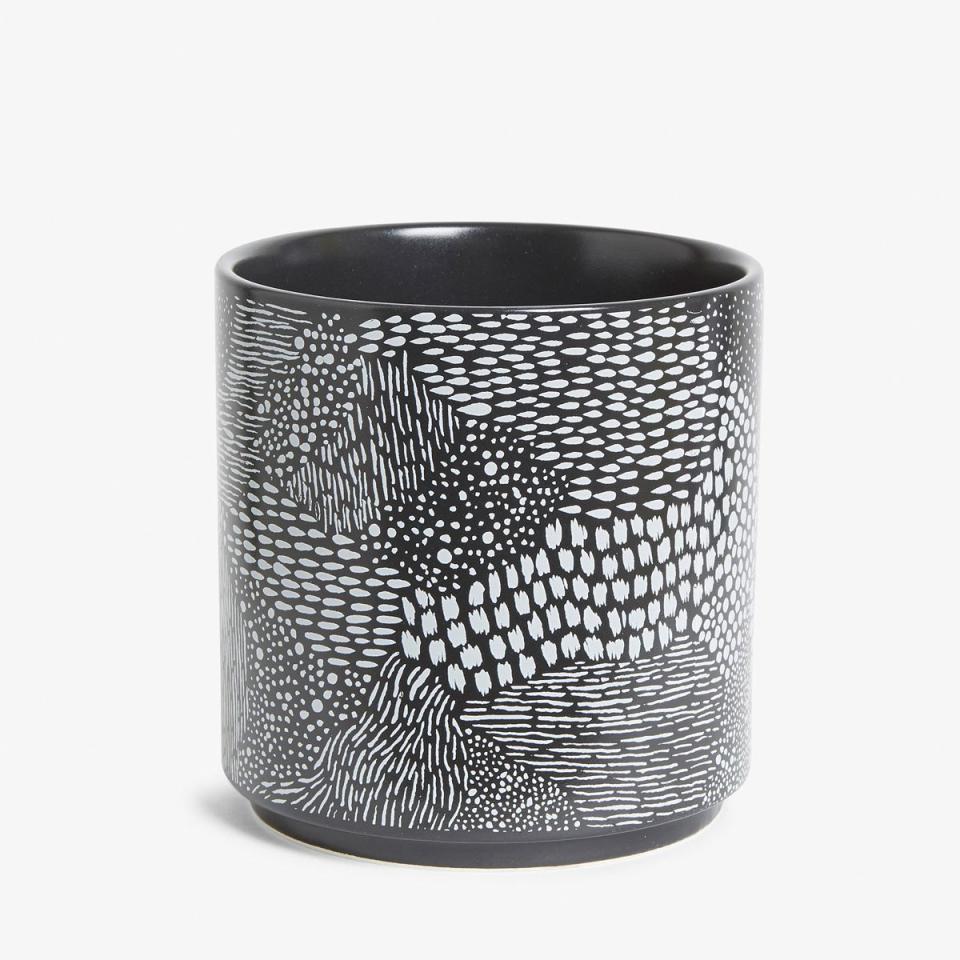 Put an air-purifying plant in this cute printed pot. Stylish and health-benefiting.