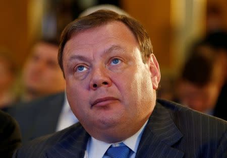 FILE PHOTO: Chairman of the supervisory board of Alfa Group consortium Mikhail Fridman attends a session during the Week of Russian Business, organized by the Russian Union of Industrialists and Entrepreneurs in Moscow, Russia March 16, 2017. REUTERS/Sergei Karpukhin/File Photo