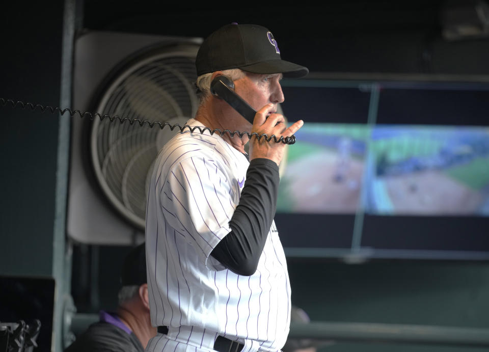 Colorado Rockies manager Bud Black talks on the bullpen phone during the sixth inning of the team's baseball game against the Arizona Diamondbacks on Friday, July 1, 2022, in Denver. (AP Photo/David Zalubowski)