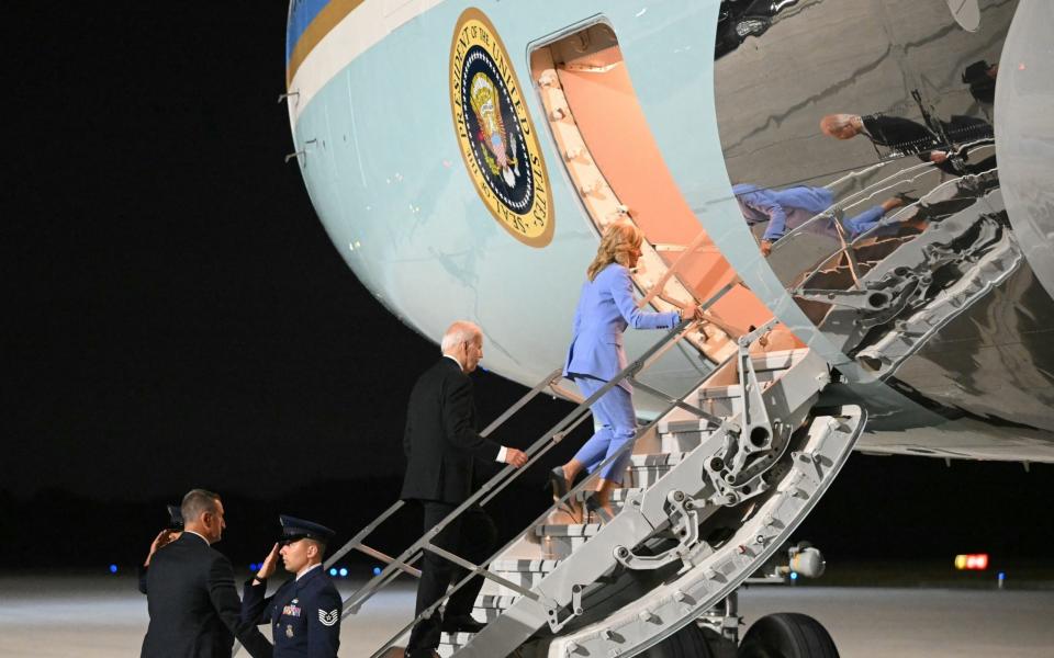 Joe Biden and First Lady Jill Biden board Air Force One before departing Dobbins Air Reserve Base in Marietta, Georgia