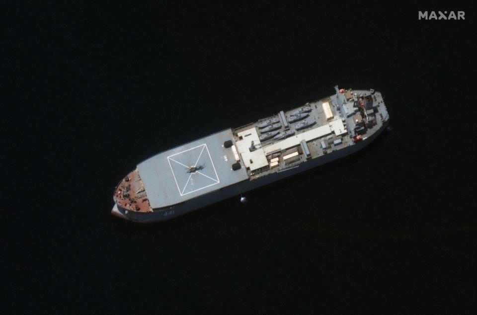 In this satellite photo provided by Maxar Technologies, the Iranian navy vessel Makran is seen off Lark Island, Iran, May 10, 2021. An Iranian destroyer and support vessel are now sailing in the Atlantic Ocean in a rare mission far from the Islamic Republic, Iran's state TV reported on Thursday, June 10, 2021, without offering the vessels' final destination. (©2021 Maxar Technologies via AP)