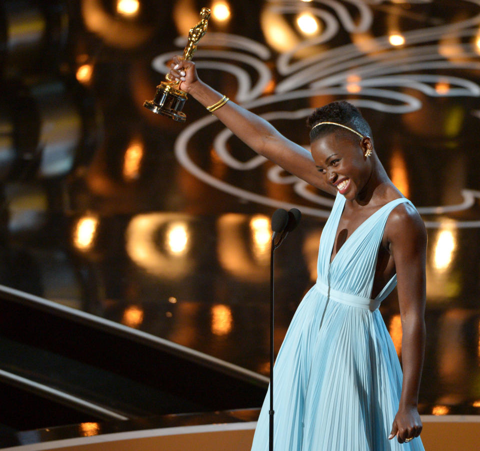 Lupita Nyong’o accepts the award for best actress in a supporting role for "12 Years a Slave" during the Oscars at the Dolby Theatre on Sunday, March 2, 2014, in Los Angeles. (Photo by John Shearer/Invision/AP)