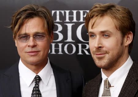 Cast members Brad Pitt and Ryan Gosling pose on the red carpet at the premiere of "The Big Short" in New York November 23, 2015. REUTERS/Shannon Stapleton