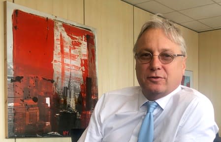 FILE PHOTO: Airbus Chief Commercial Officer Christian Scherer speaks during an interview with Reuters in his office at the planemaker’s headquarters in Toulouse