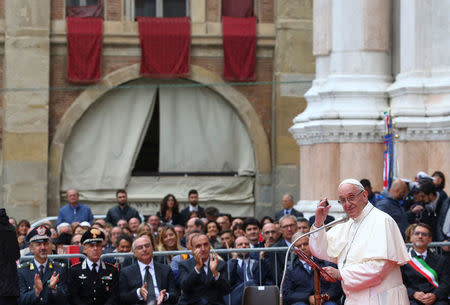 Pope Francis waves during a meeting with representatives of the world of labour in Maggiore square, during a pastoral visit in Bologna, Italy October 1, 2017. REUTERS/Alessandro Bianchi