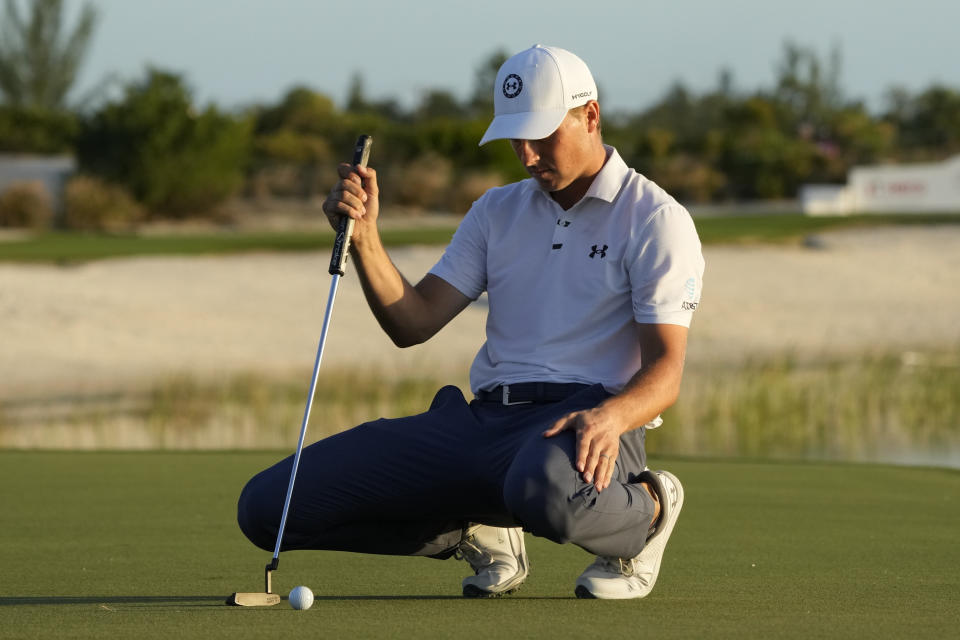 Jordan Spieth, of the United States, lines up his putt on the 17th green during the third round of the Hero World Challenge PGA Tour at the Albany Golf Club, in New Providence, Bahamas, Saturday, Dec. 2, 2023. (AP Photo/Fernando Llano)