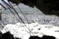 A general view shows the northern town of Ariha, one of the last government strongholds in the Idlib province, as seen from the rebel-held area of Jabal al-Arbaeen May 26, 2015. REUTERS/Khalil Ashawi