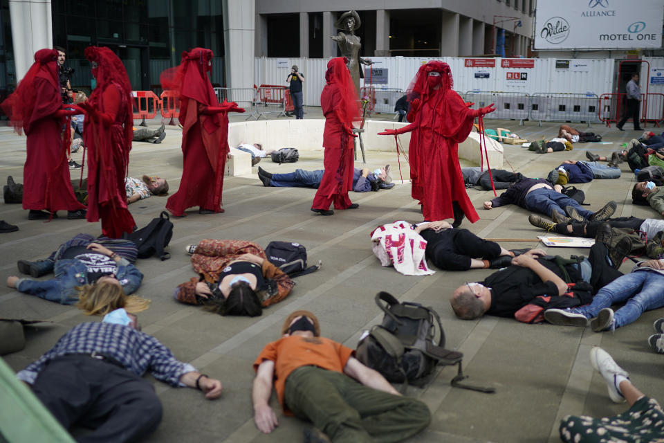 MANCHESTER, UNITED KINGDOM - SEPTEMBER 01: Climate change protesters from Extinction Rebellion perform a 'die-in' outside the government's Department for Work and Pensions (DWP) on September 1, 2020 in in Manchester, United Kingdom. The environmental activist group have organised several events across the UK timed for the return of government officials from the summer holiday. (Photo by Christopher Furlong/Getty Images)