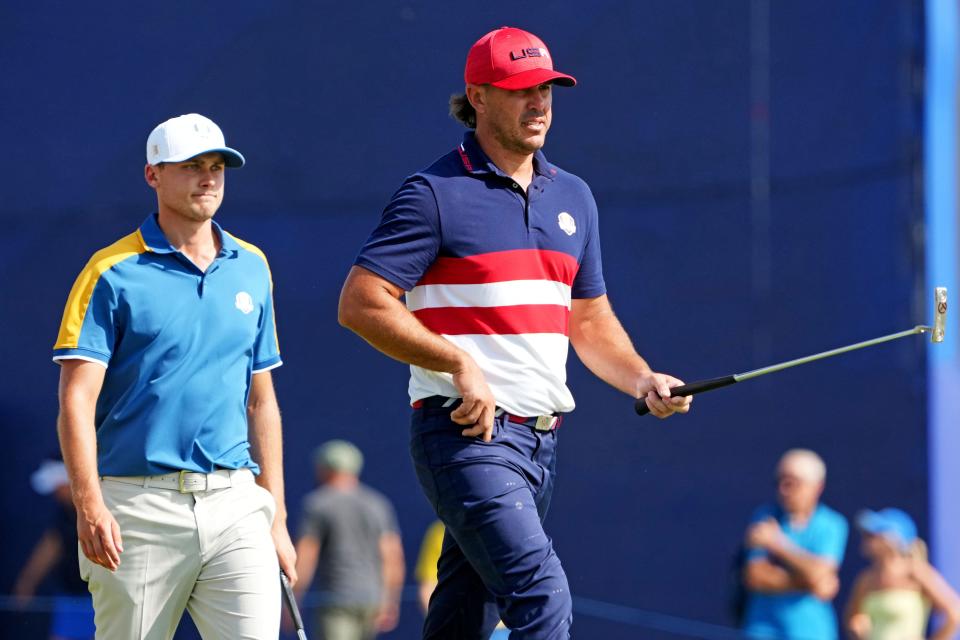 Oct 1, 2023; Rome, ITA; Team Europe golfer Ludvig Aberg and Team USA golfer Brooks Koepka on the seventh green during the final day of the 44th Ryder Cup golf competition at Marco Simone Golf and Country Club. Mandatory Credit: Kyle Terada-USA TODAY Sports