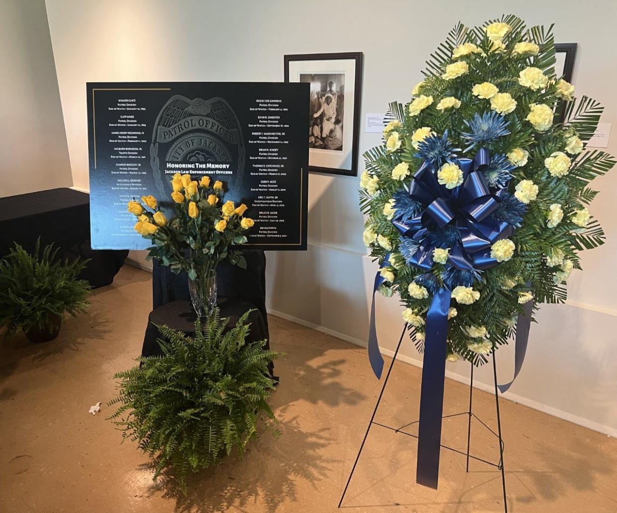 The Jackson Police Department honors fallen officers with flowers and a wreath at the annual Police Memorial Service.