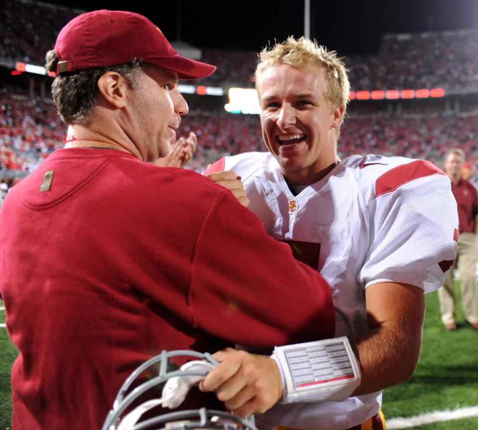 Southern California Trojans quarterback Matt Barkley is congratulated by Will Ferrell after the Trojans' 18-15 victory over the Ohio State Buckeyes at Ohio Stadium on Sep 12, 2009, in Columbus, Ohio.