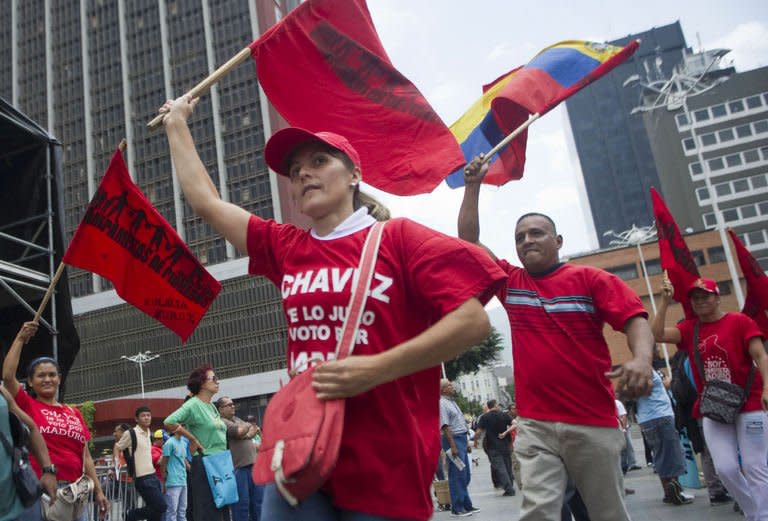 Supporters of Venezuelan President Nicolas Maduro arrive to attend a concert organized by groups supporting Maduro in Caracas on April 17, 2013