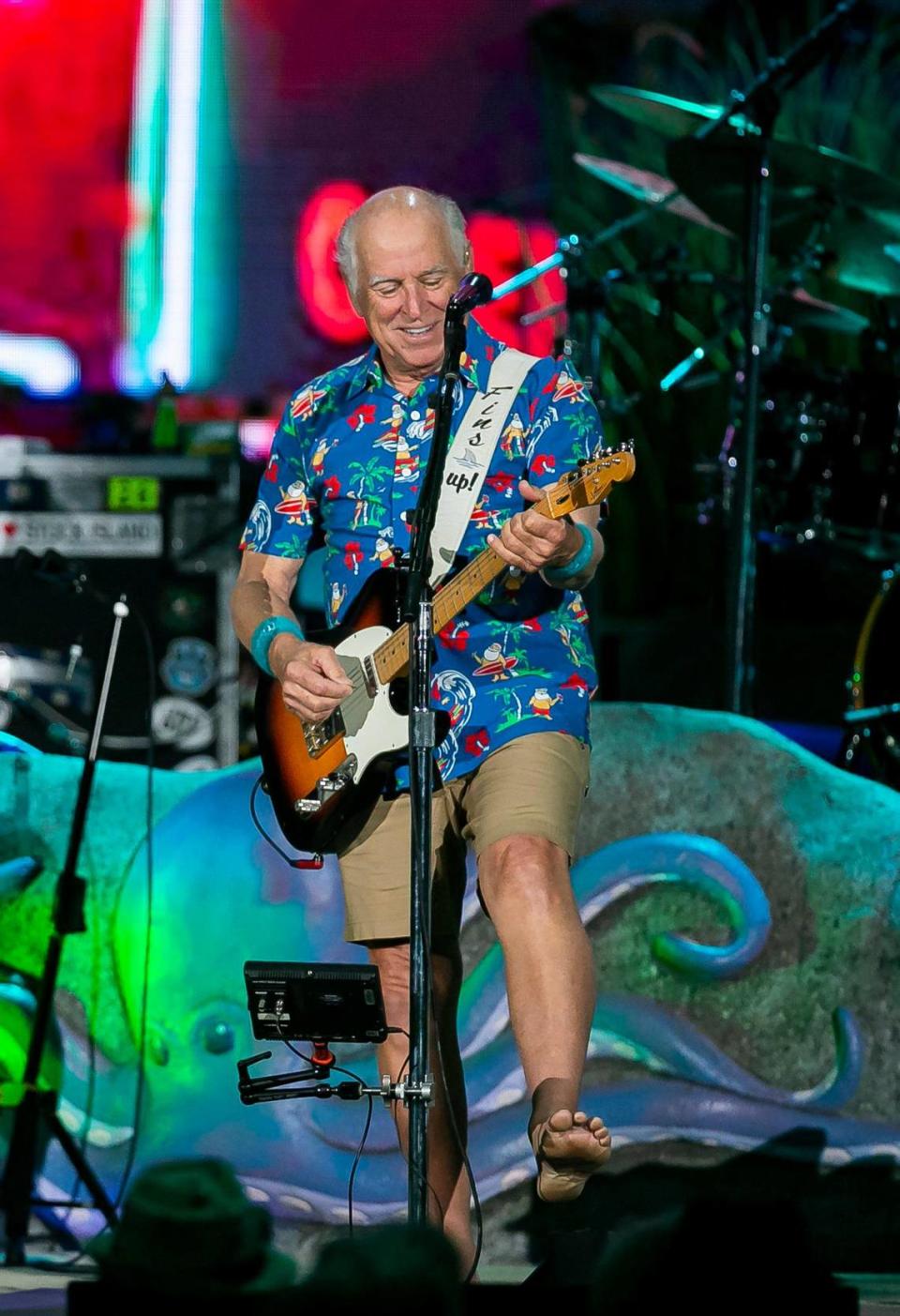 Jimmy Buffett and his Coral Reefer Band perform during their concert at the iTHINK Financial Amphitheatre in West Palm Beach, Florida on Thursday, Dec. 9, 2021.