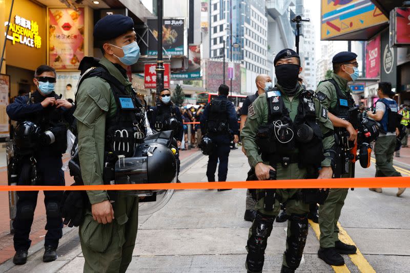 Police stand guard to avoid mass gathering during protest in Hong Kong