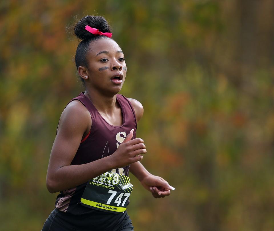 Stow's Jayla Atkinson runs in the girls National conference race during the Suburban League Cross Country Championships, Saturday, Oct. 15, 2022, in Norton, Ohio.
