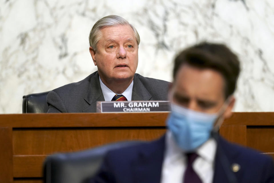 Sen. Lindsey Graham, R-S.C., speaks during the second day of confirmation hearings for Supreme Court nominee Amy Coney Barrett before the Senate Judiciary Committee on Capitol Hill in Washington, Tuesday, Oct. 13, 2020. (Stefani Reynolds/Pool via AP)