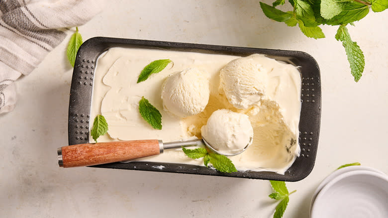 scooping ice cream out of loaf pan