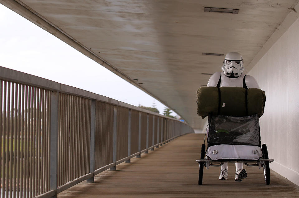 PERTH, AUSTRALIA - JULY 15: Stormtrooper Paul French is pictured on day 5 of his over 4,000 kilometre journey from Perth to Sydney walks along Port Bouvard bridge on July 15, 2011 in Perth, Australia. French aims to walk 35-40 kilometres a day, 5 days a week, in full Stormtrooper costume until he reaches Sydney. French is walking to raise money for the Starlight Foundation - an organisation that aims to brighten the lives of ill and hostpitalised children in Australia. (Photo by Paul Kane/Getty Images)