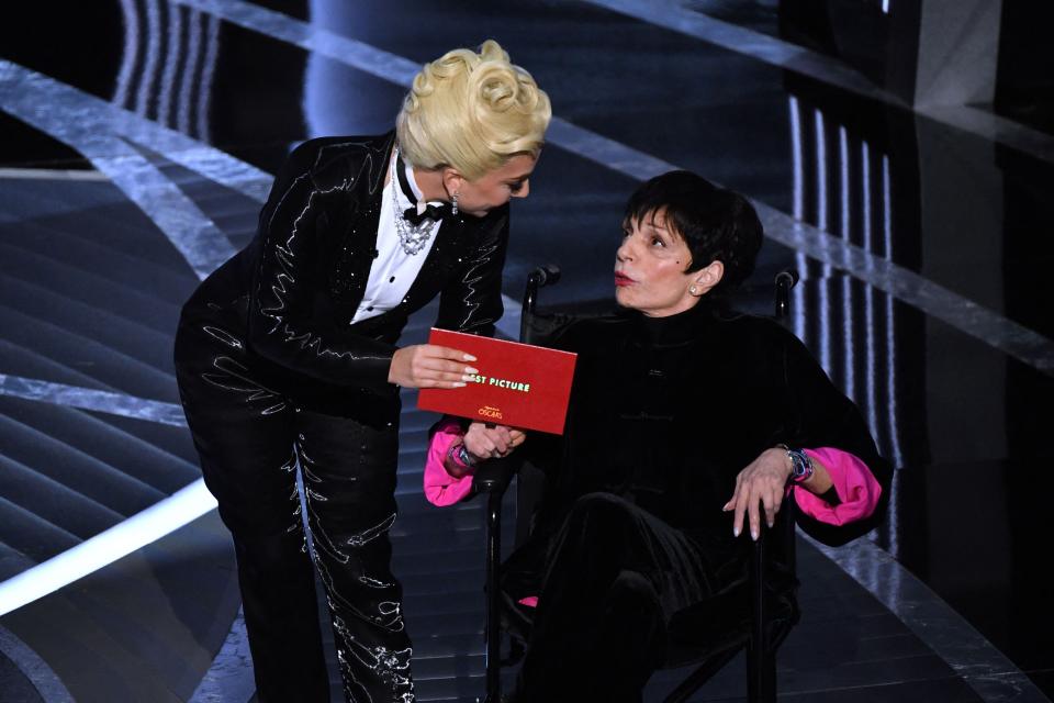 Lady Gaga, left, and Liza Minnelli announce the Best Picture award  at the 94th Academy Awards at the Dolby Theatre in Los Angeles on Sunday, March 27, 2022.