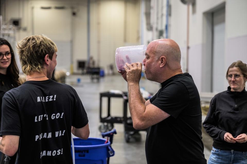 Winemaker Roy Piper tasting juice from the 2023 harvest at VintEdge with the international interns.<p>Courtesy of VintEdge | Photo by Bryan Gray</p>
