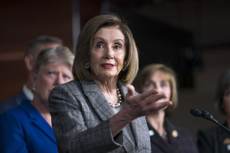 Speaker of the House Nancy Pelosi, D-Calif., discusses her recent visit to the UN Climate Change Conference in Madrid, Spain, during a news conference with the congressional delegation to that summit, at the Capitol in Washington, Friday, Dec. 6, 2019. (AP Photo/J. Scott Applewhite)
