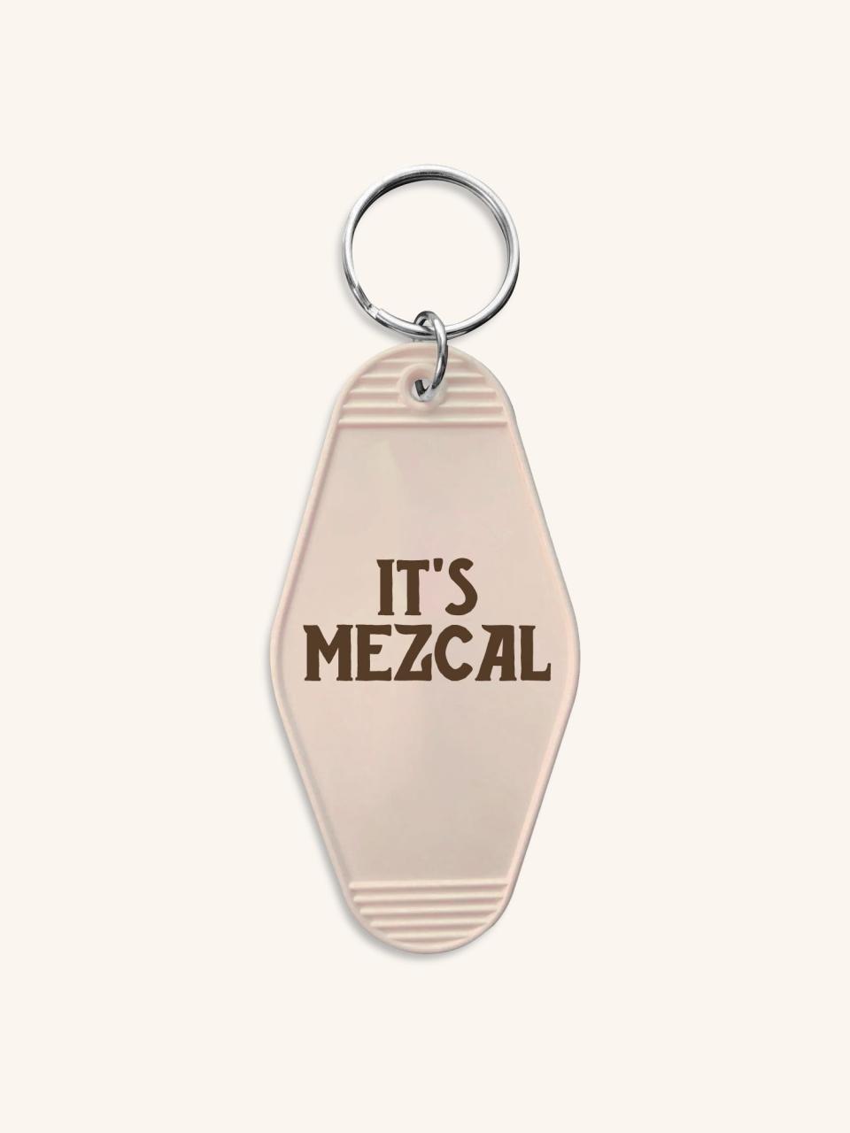 <p><a href="https://merch.doshombres.com/collections/all/products/its-mezcal-keychain" rel="nofollow noopener" target="_blank" data-ylk="slk:Shop Now;elm:context_link;itc:0;sec:content-canvas" class="link ">Shop Now</a></p><p>It's Mezcal Keychain</p><p>doshombres.com</p><p>$10.00</p>