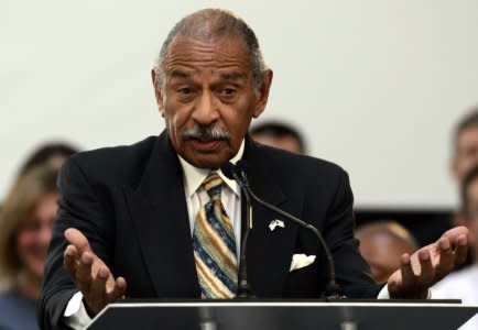 File Picture: U.S. Representative John Conyers addresses the audience during a program to announce the first round of loan commitments to transform older factories during a news conference at the Ford Motor Research & Innovation Center in Dearborn, Michigan June 23, 2009. REUTERS/Rebecca Cook
