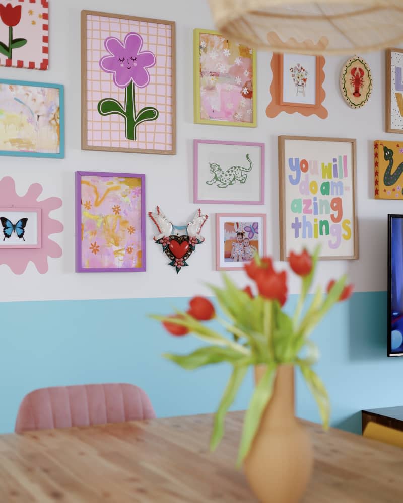 blue and white dining room, focus on gallery wall