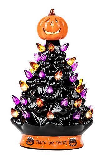 <p><strong>RJ Legend</strong></p><p>amazon.com</p><p><strong>$29.90</strong></p><p>Light up your Halloween decor with this cute LED tree! It stands 9 inches tall. </p>