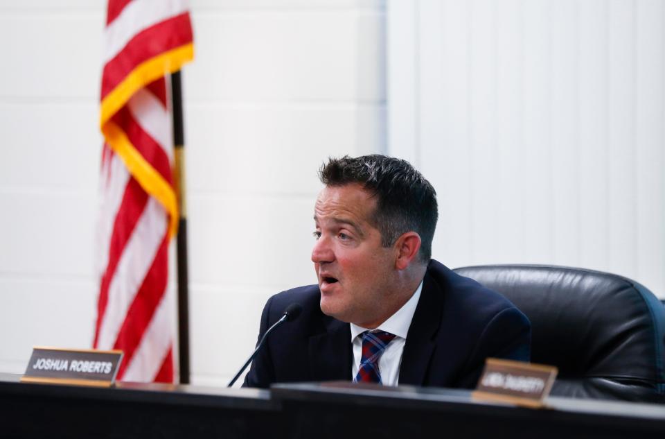 Nixa school board vice president Josh Roberts, photographed during a May 12 meeting, read a statement prior to the pubic comment period Thursday.