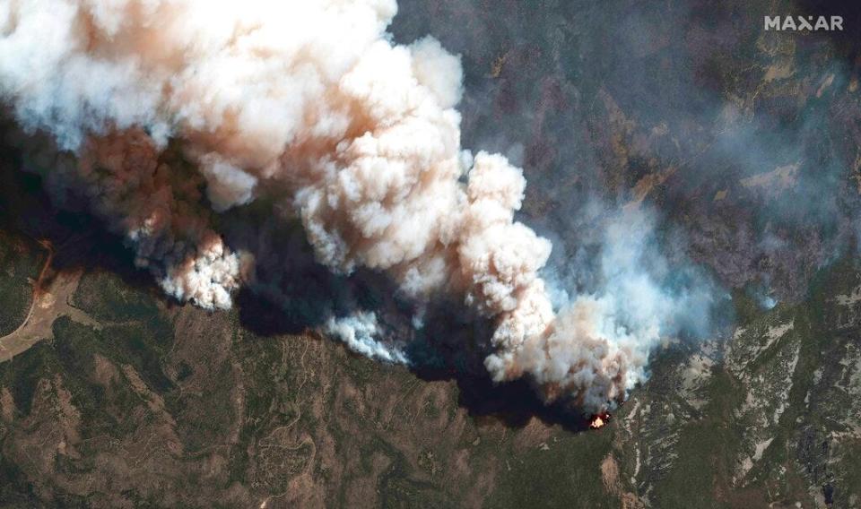 This satellite image provided by Maxar Technologies shows the active fire lines of the Hermits Peak wildfire, in Las Vegas, N.M., May 11, 2022. More than 5,000 firefighters are battling multiple wildland blazes in dry, windy weather across the Southwest. Evacuation orders remained in place Thursday, May 19, 2022, for residents near fires in Texas, Colorado and New Mexico.