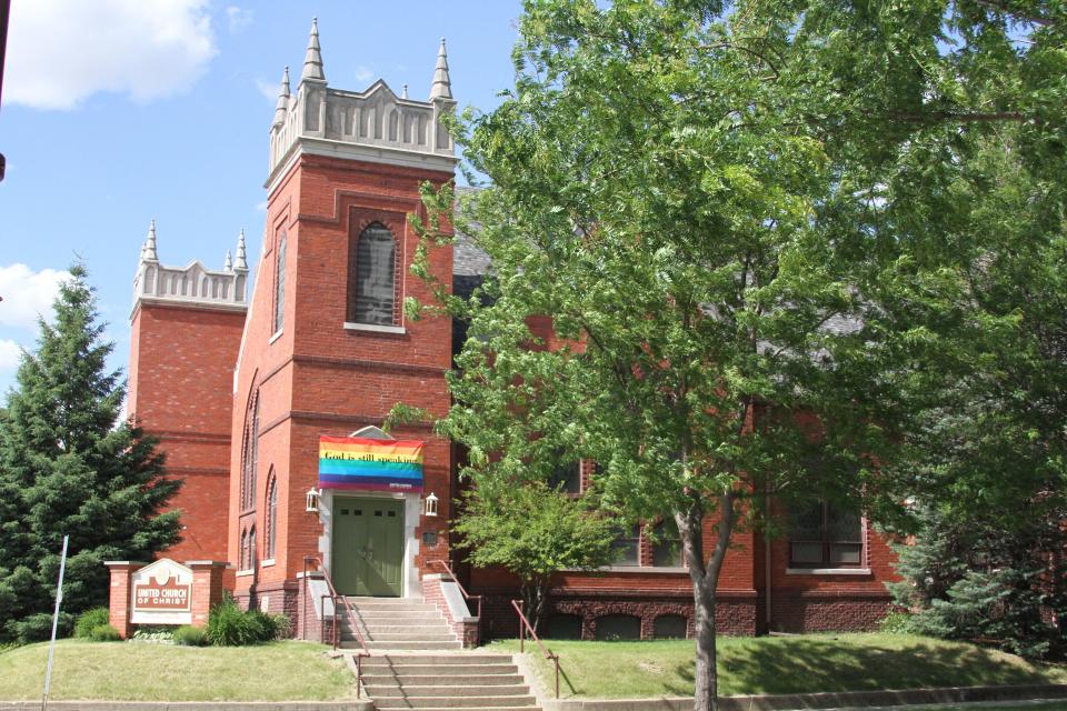 The United Church of Christ is seen in Ames, Iowa. The banner above the doorway reads "God is still speaking." The banner was stolen and lit on fire on early Tuesday morning.