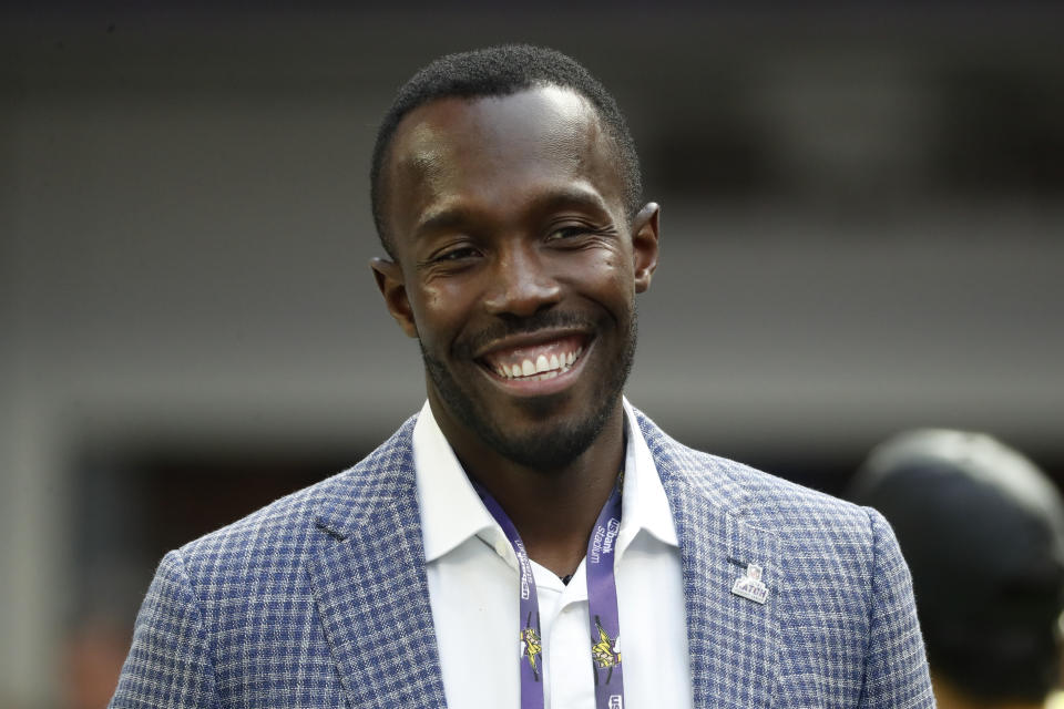 FILE - Minnesota Vikings general manager Kwesi Adofo-Mensah stands on the field before an NFL football game against the Chicago Bears, Sunday, Oct. 9, 2022, in Minneapolis. His parents emigrated from Ghana. (AP Photo/Bruce Kluckhohn, File)