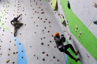 In this Friday, Jan. 17, 2020, photo, staff members of Asian Trekking, a Nepal-based mountaineering company, participate in a training session in Kathmandu, Nepal. Once relegated to support staff, Nepalese climbers famous for their skills on the world's highest peaks are emerging out of the shadows of their Western peers and now dominate the lucrative industry in the Himalayan nation. Sherpa guides are now more educated, and have traveled farther than their predecessors, picking up business acumen and corporate endorsements. As a result, there are more Nepal-based companies globally, not just in Nepal, but also in China, India and Pakistan, which collectively boast the world's 14 highest peaks. (AP Photo/Niranjan Shrestha)