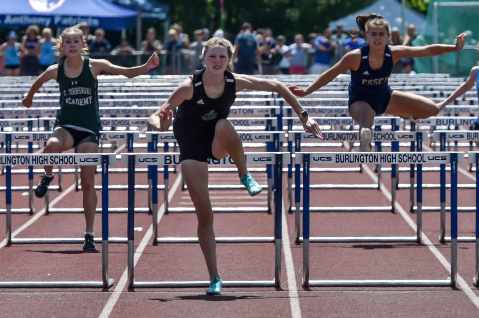 Colchester's Ryleigh Garrow finishes first in the girls 100 meter hurdles at the 2022 Vermont D1 State Track and Field Championships held at Burlington High School.