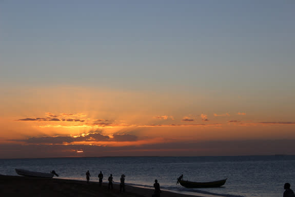 Fishermen at sunset in Mozambique.