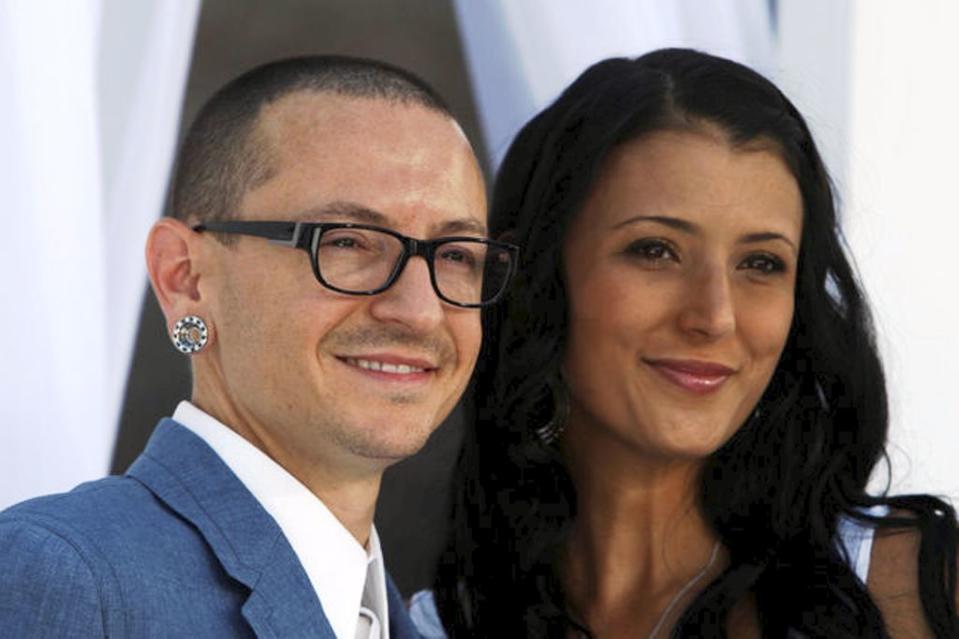 Linkin Park vocalist Chester Bennington and wife Talinda Ann Bentley arrive at the 2012 Billboard Music Awards in Las Vegas, May 20, 2012.