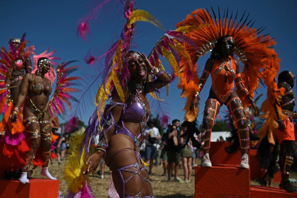 Performers from the Notting Hill Carnival dance at Glastonbury festival in Somerset (AFP/Getty)