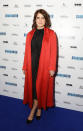 <p>On December 18, Princess Eugenie demonstrated her newfound fashion credentials in a coral coat (next year’s ‘it’ hue) and a slick black dress. <em>[Photo: Getty]</em> </p>